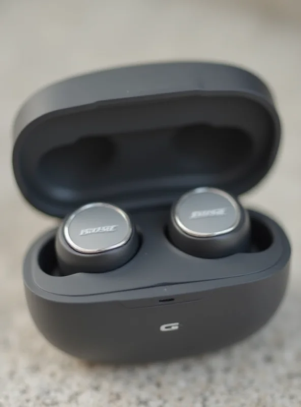 Close-up shot of Bose QuietComfort Ultra Earbuds in their charging case