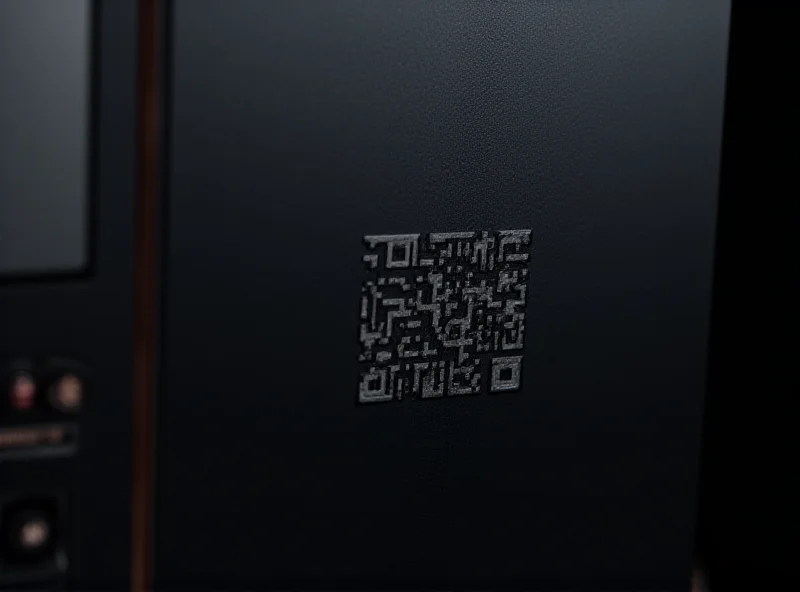 Close-up of Alienware Area-51 PC with visible QR codes