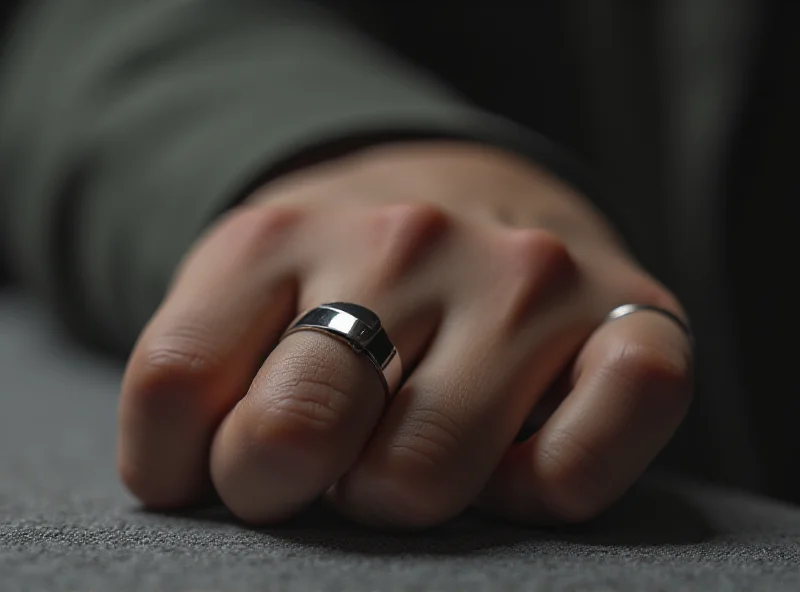 Close-up of a Gabit Smart Ring on a finger