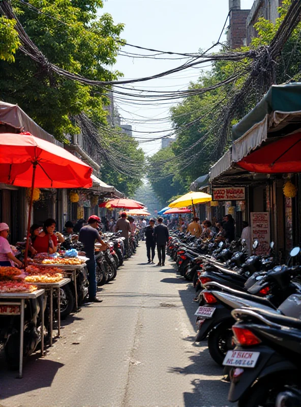 A bustling street scene in Vietnam, with food stalls and motorbikes.