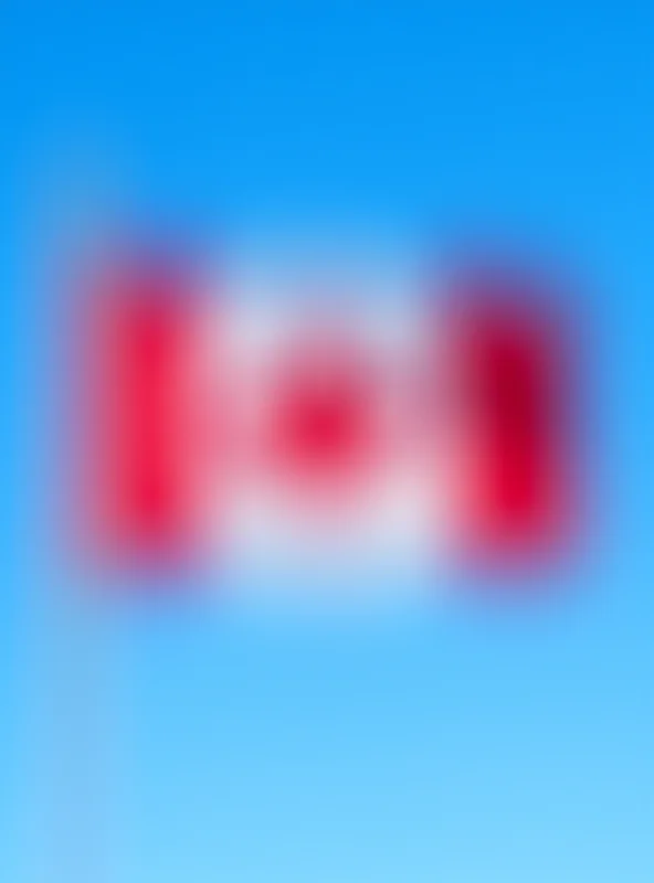 Image of the Canadian flag waving in the wind