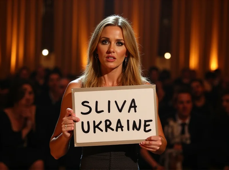 Daryl Hannah on stage at the Oscars with a sign supporting Ukraine