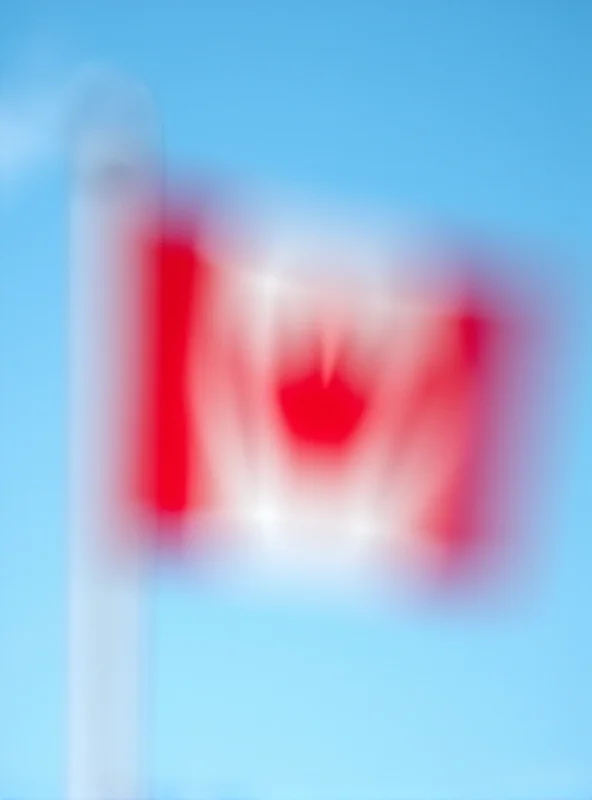 Close-up of a Canadian flag waving in the wind.