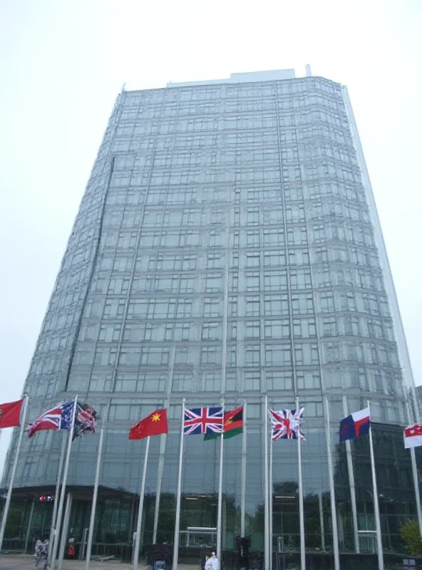 Image of NATO headquarters with a question mark overlayed