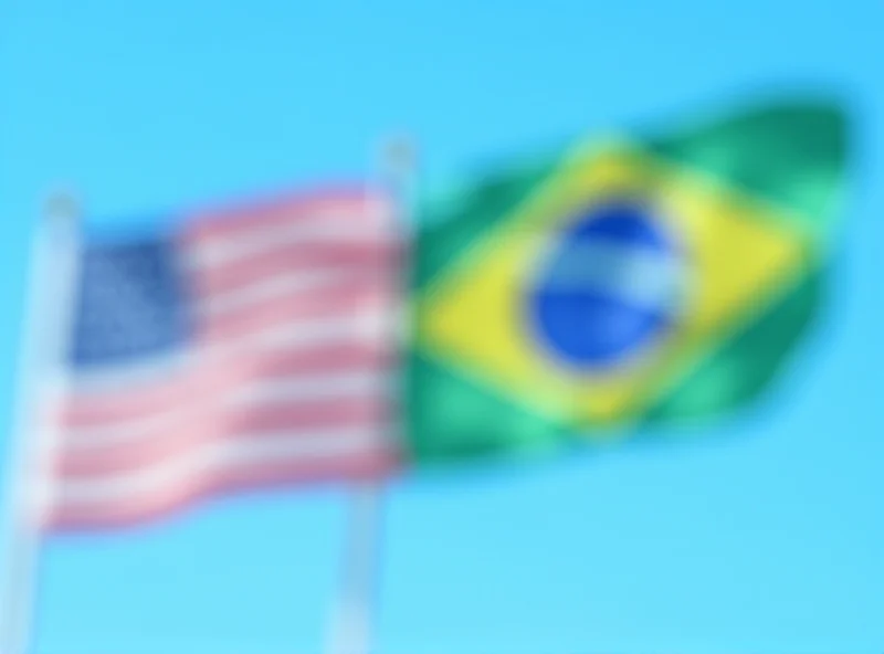 Image of the US and Brazilian flags waving together