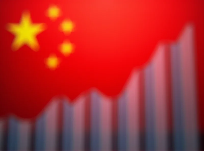 Chinese flag with economic graphs in the background