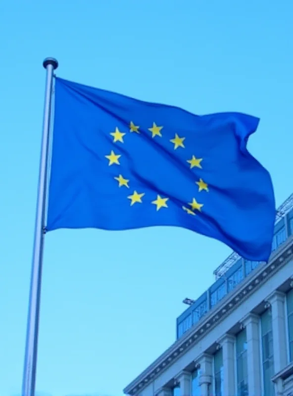 EU flag waving in front of the European Commission building in Brussels.