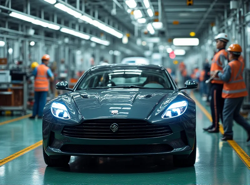 An American-made car rolling off the assembly line in a factory. The scene is busy and filled with workers. A close-up on the car is shown.