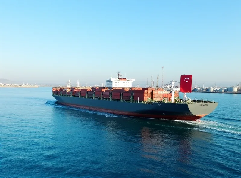 A modern cargo ship sailing on the Caspian Sea with the Turkmen flag waving in the wind. In the background, the coastline of Turkmenistan is visible with industrial facilities and oil rigs.