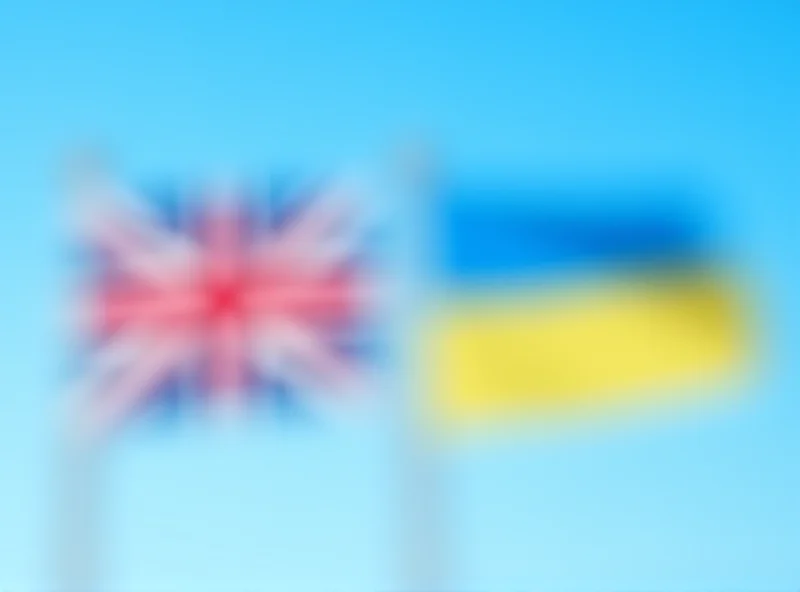 Image of the UK and Ukrainian flags waving side-by-side, symbolizing the loan agreement