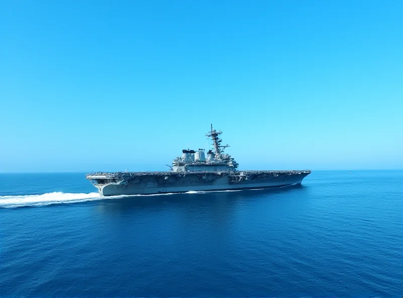 A modern US Navy ship sailing on the ocean.