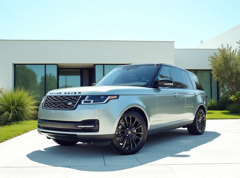 A luxury Range Rover SE parked in front of a modern house.